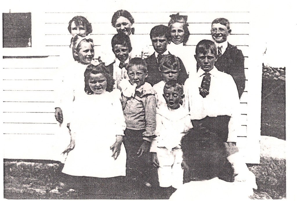Quonochontaug School Children - 1904 Top Row: Anna Streeter, Ethel Smith, Martha Smith, Thurman Eldridge Middle Row: Sadie Smith, Edward Hoxsie, Henry Hoxsie Third Row: Jessie Wilcox, Walter Hosxie, Alfred Pendleton, Roy Smith Small boy in Front: Asa Hoxsie